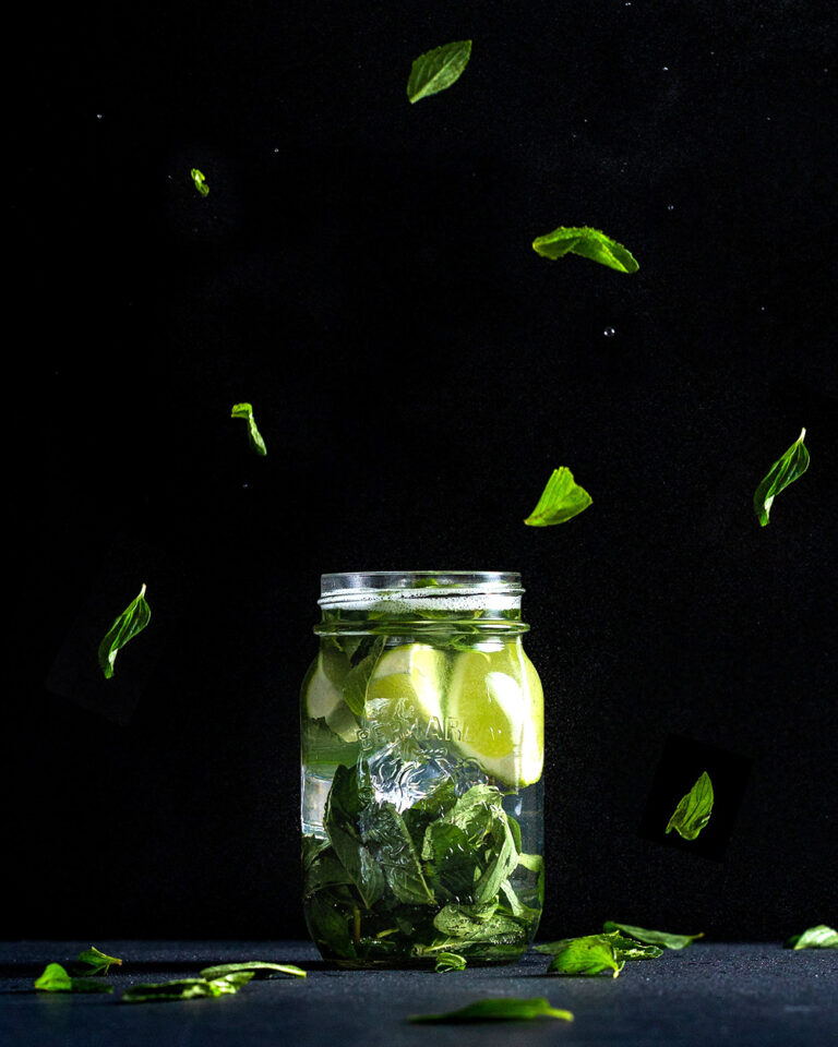 Zesty Essence: Sliced Lime Preserved in a Clear Glass Jar